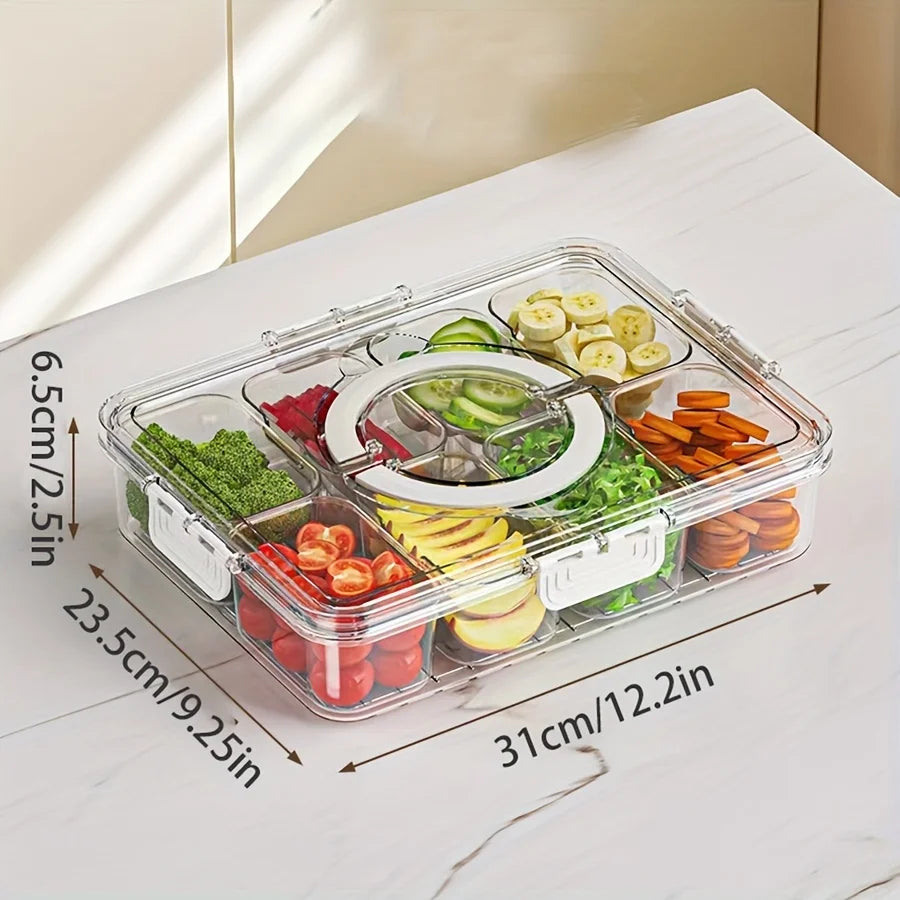 A clear portable snack container with a lid filled with various fresh vegetables and fruits.