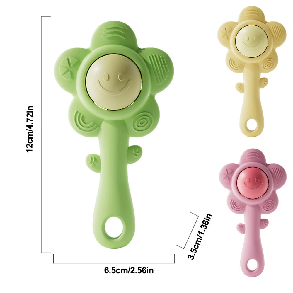 A set of three baby teething rattles in light green, yellow, and pink with chewable grippers.