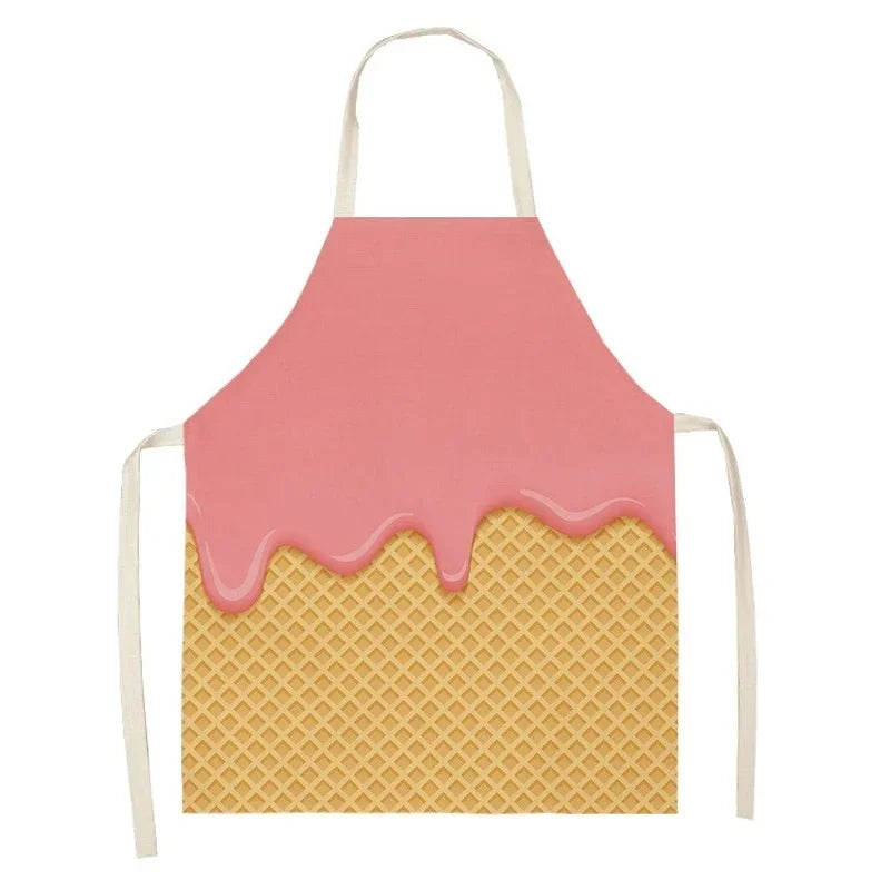 A pink dripping linen kitchen apron with a yellow waffle texture.
