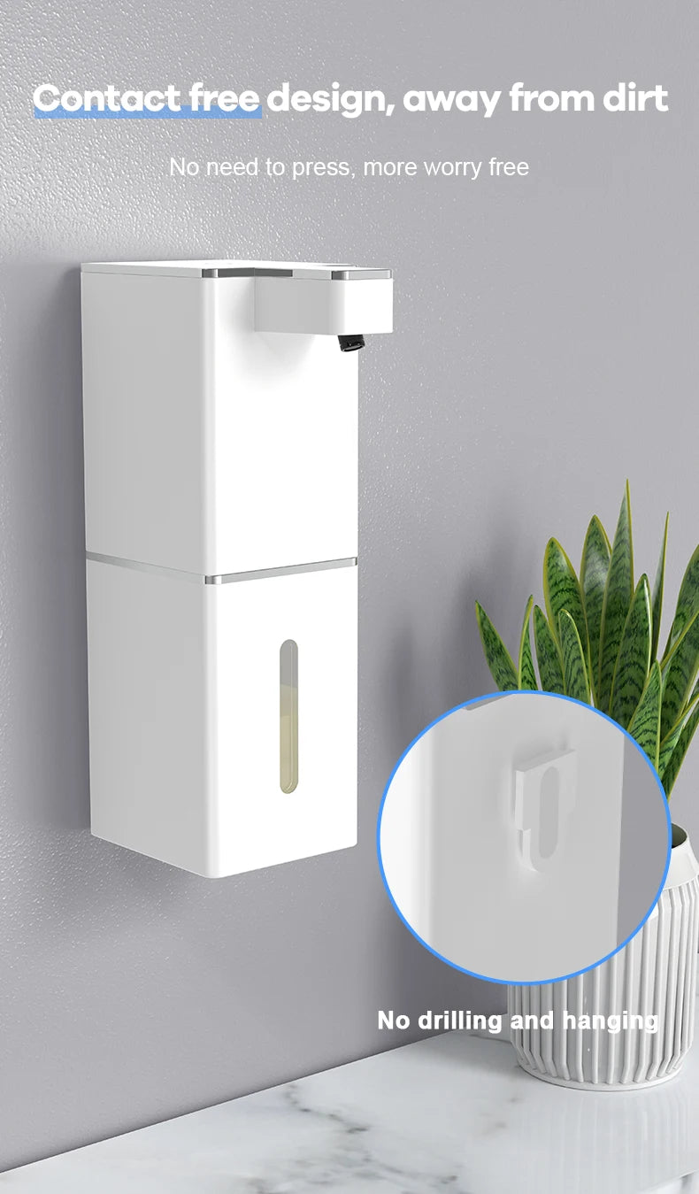 A white touchless infrared smart soap dispenser mounted on a wall, designed for contact-free use.