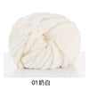 A ball of white chunky acrylic yarn used for knitting and crochet
