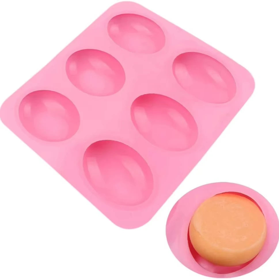 A pink silicone mold with six cavities for soap, baking, and DIY crafts.