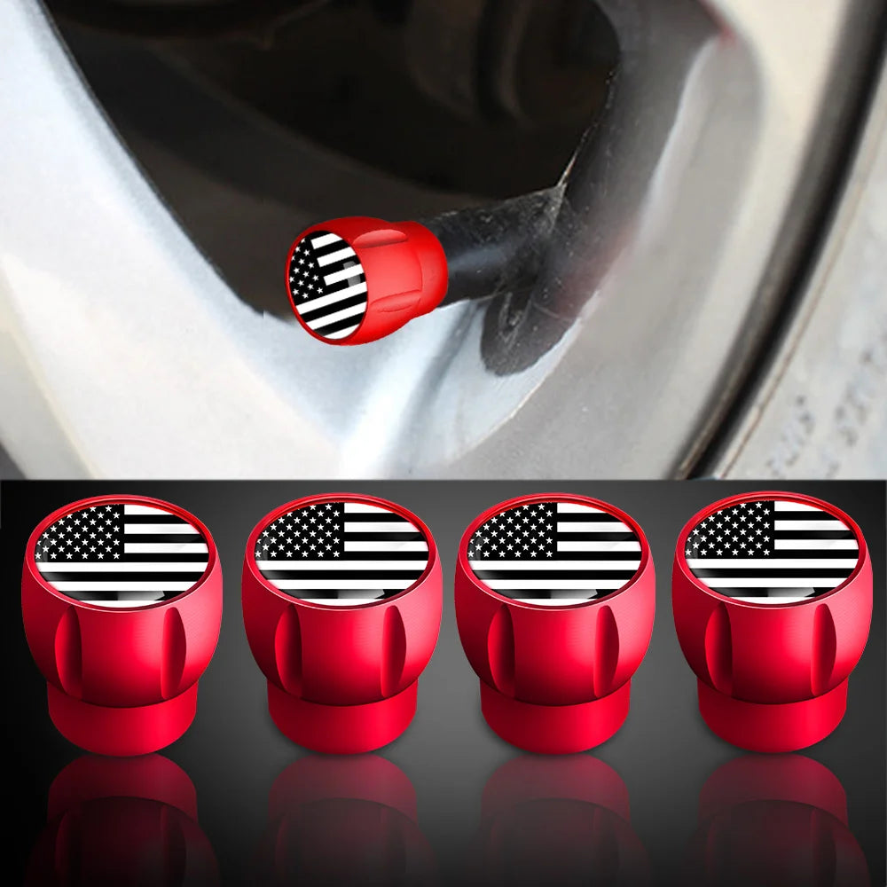 Set of four red American flag tire valve caps shown in various angles and reflections.