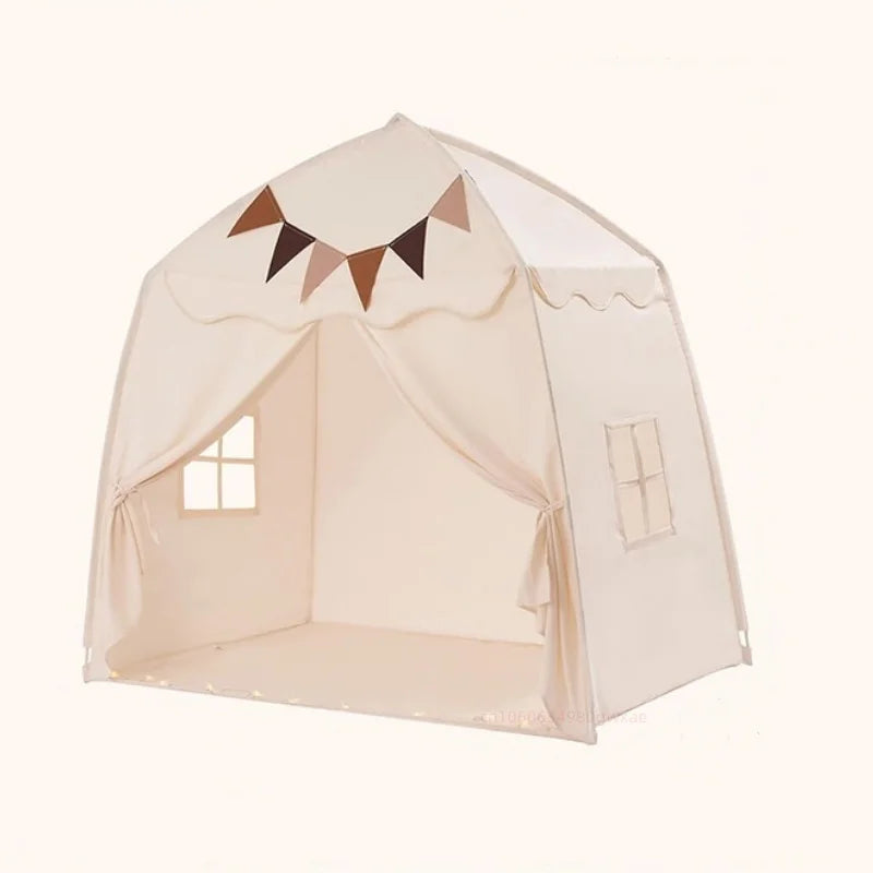 A light beige foldable kids teepee play tent with a peaked roof and decorative bunting.