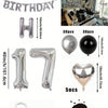 A kit featuring black and silver foil numbers, balloons, and a garland for birthday decorations.