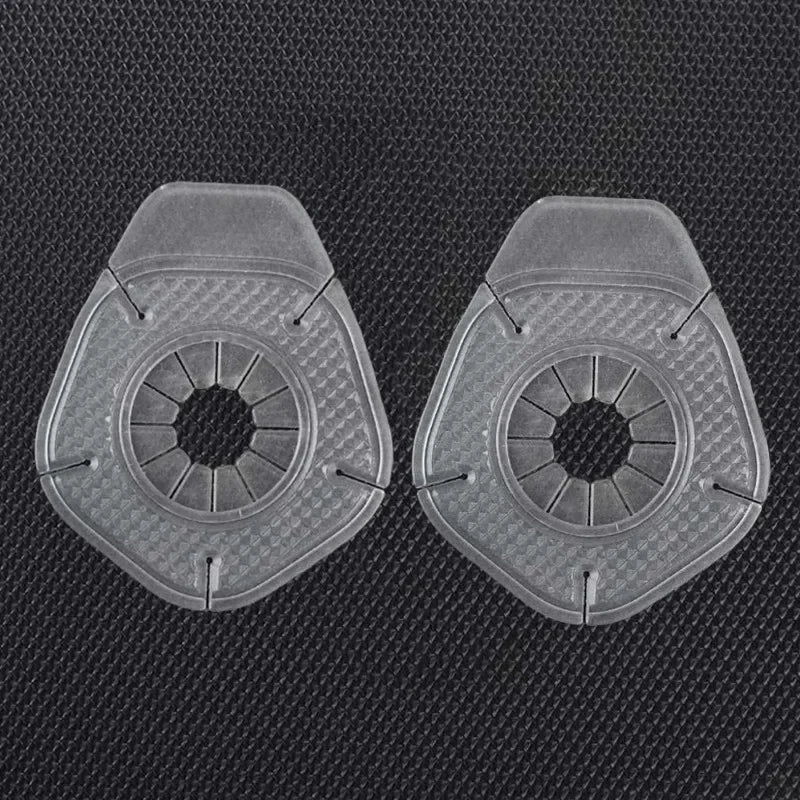 A pair of clear silicone windshield wiper arm hole covers for a vehicle.