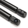 A pair of black heavy-duty hood lift supports for a Jeep Liberty, showing the threaded and locking mechanism.