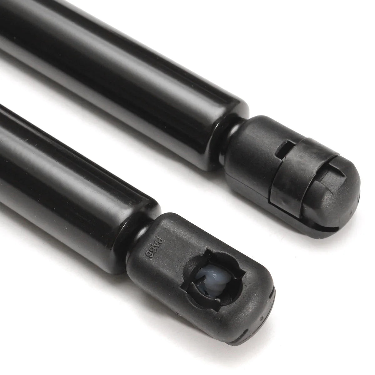 A pair of black heavy-duty hood lift supports for a Jeep Liberty, showing the threaded and locking mechanism.