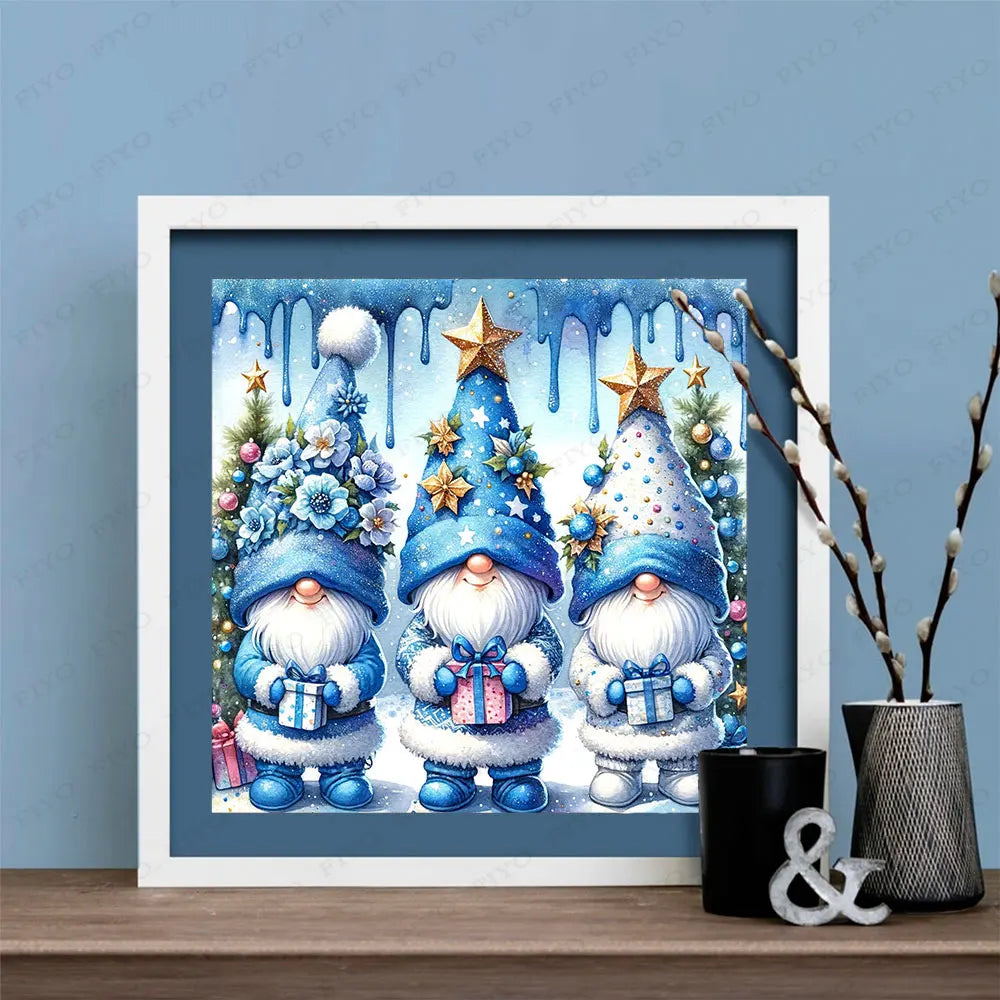 Kit de peinture diamant encadré avec trois gnomes de Noël mosaïques aux tenues hivernales bleu et blanc sur fond bleu