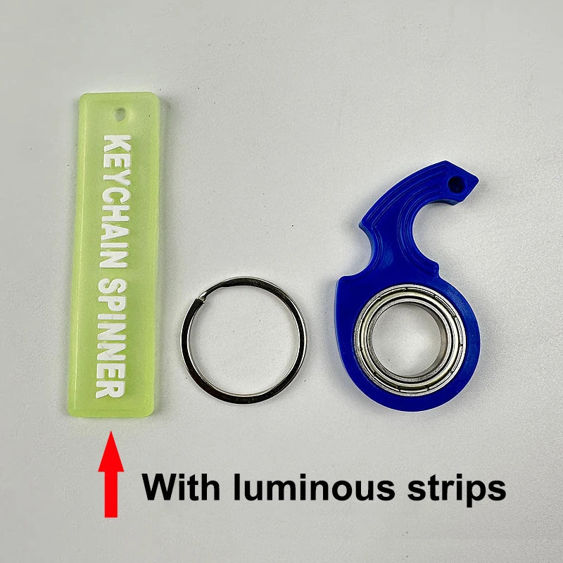 A lime green keychain spinner with luminous strips and a blue spinner component.