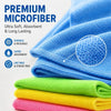 Stack of blue, green, yellow, and pink premium microfiber cleaning cloths showing texture detail