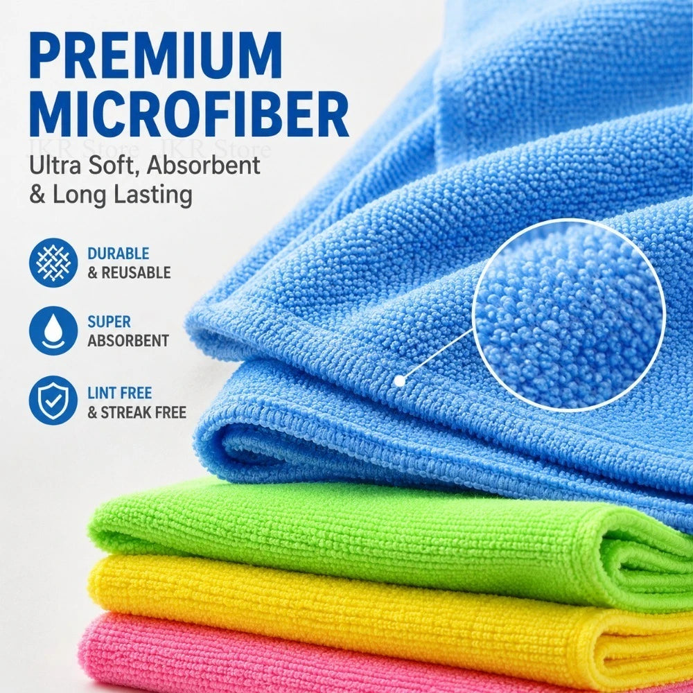 Stack of blue, green, yellow, and pink premium microfiber cleaning cloths showing texture detail