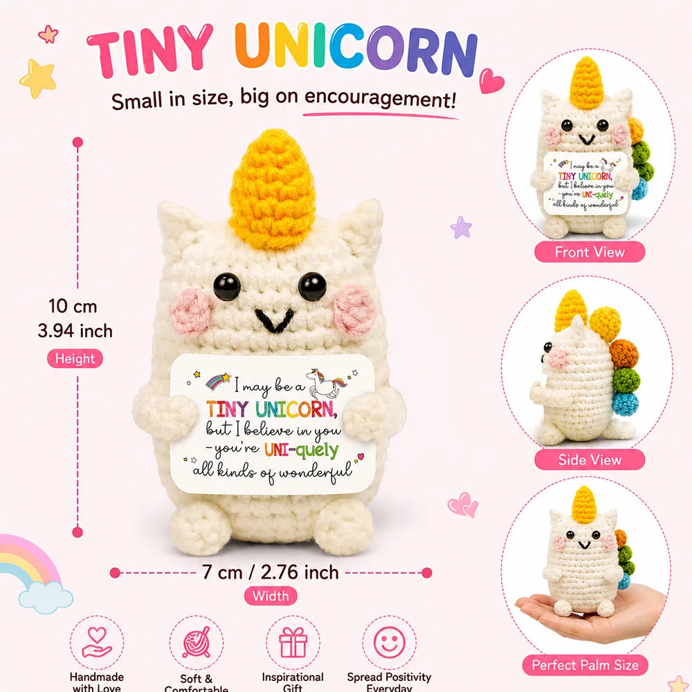 A small white unicorn crochet doll with yellow accents shown from front and side views.