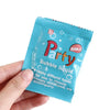 A hand holds a teal plastic package of Bubble liquid refills for a party, labeled 3+ ages.