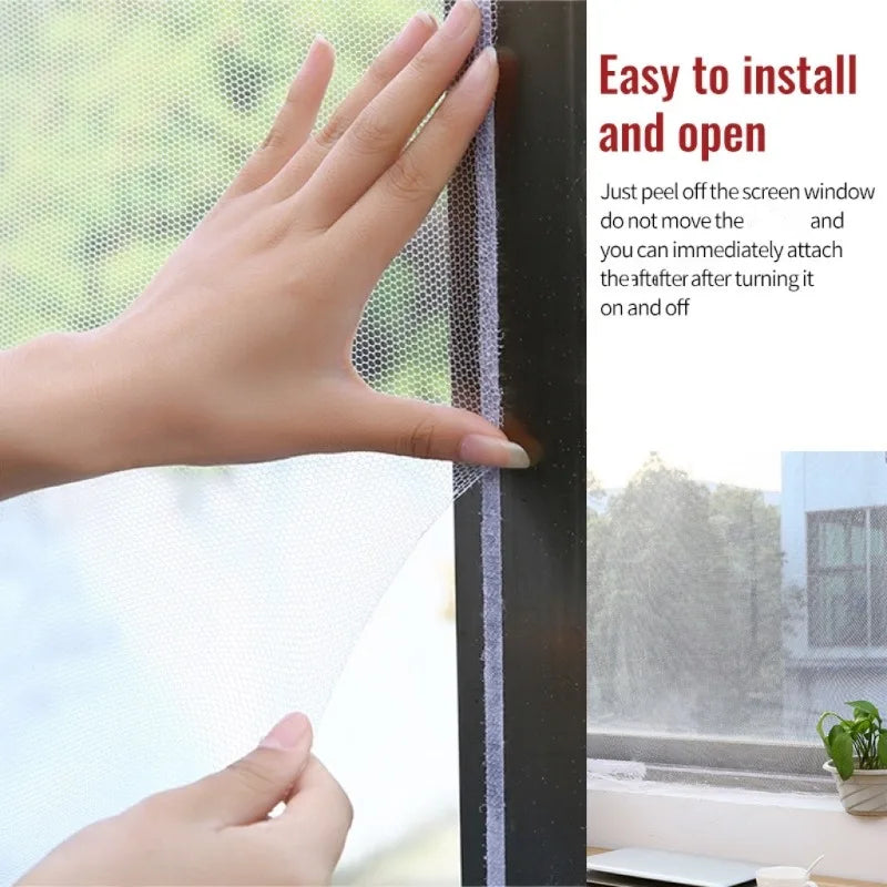 A hand is peeling off a self-adhesive invisible mosquito screen from a window frame.