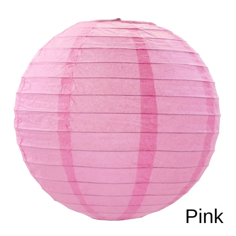 Pink round paper lantern with vertical folds