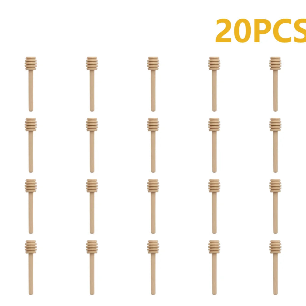 A set of twenty natural wood honey dipper sticks.