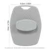A gray silicone body scrubber and massage brush with a contoured shape.