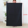 A person demonstrates the size of an extra large heavy-duty canvas laundry bag, showing a height of 74cm and a length of 120c