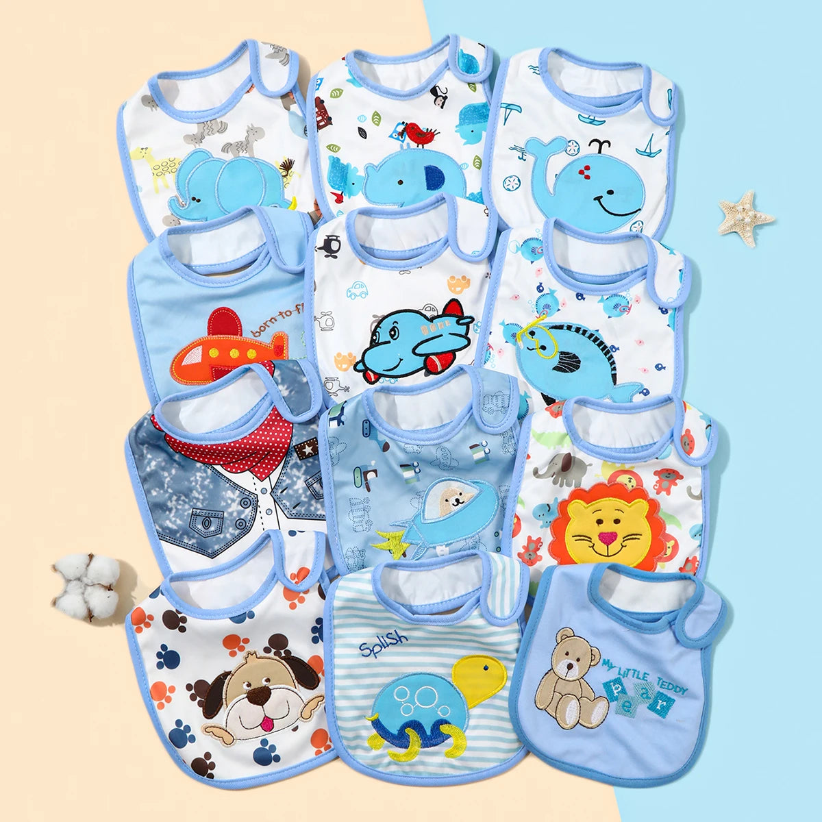 A set of waterproof baby bibs and burp cloths featuring various cartoon animal prints in blue, yellow, and white.
