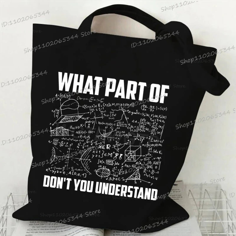 Black canvas tote bag with white text that reads What part of don't you understand