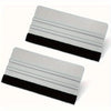 A silver scratch-free vinyl applicator tool with black grip, shown from the side.
