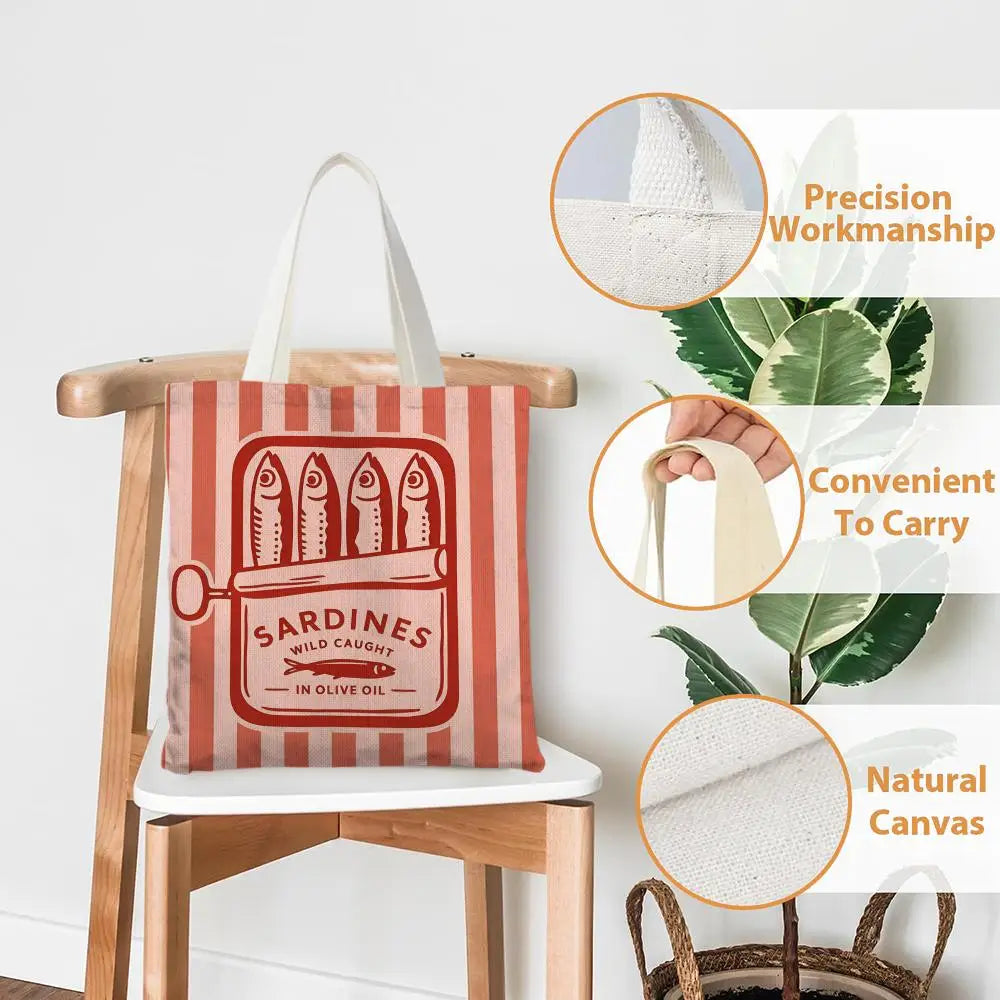 A striped canvas tote bag featuring a red sardine print, shown with close-ups highlighting its precision workmanship and natu