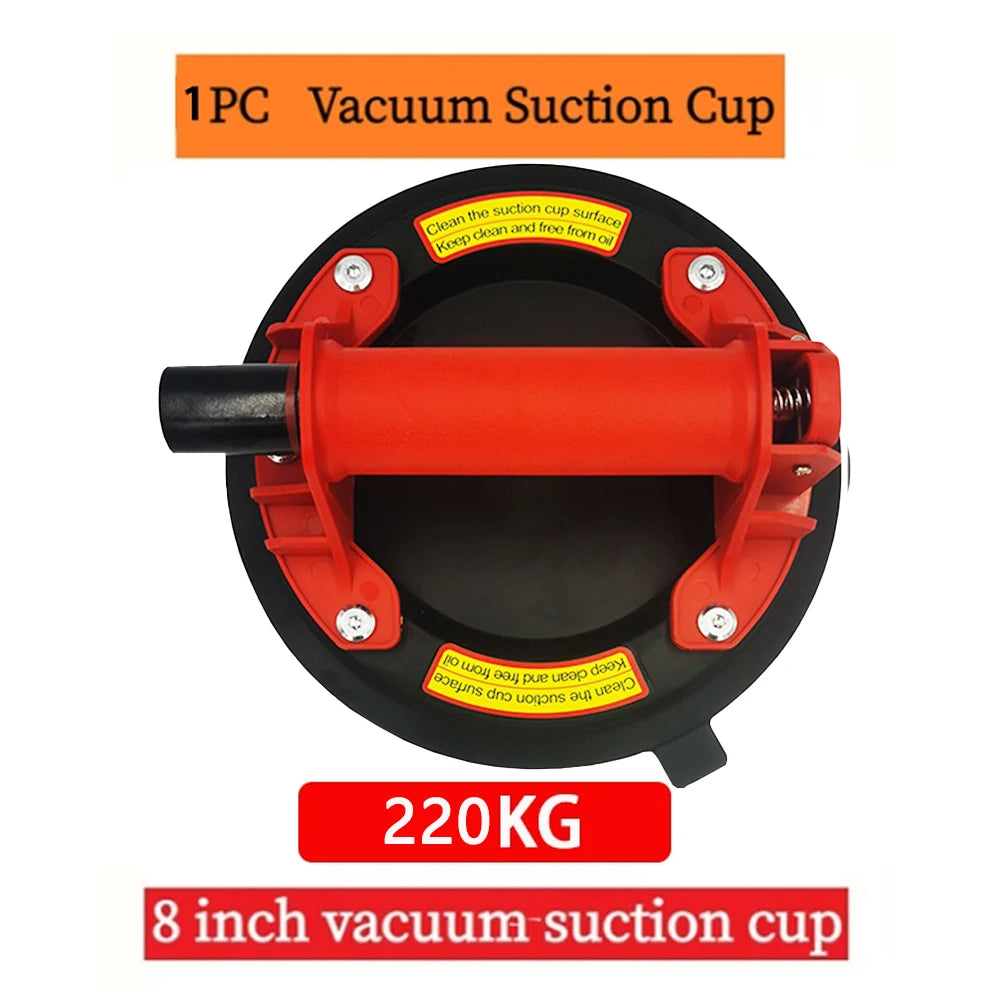 A black vacuum suction cup with an orange handle and mounting mechanism, labeled for 220KG capacity.