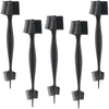 A set of black edge control brushes for hairlines and wigs.
