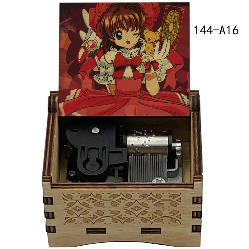 A wooden music box featuring a cardcaptor sakura character illustration and an internal mechanism.