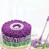 A set of two purple and green microfiber spinning mop heads for cleaning.