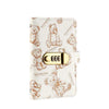 A beige wallet organizer featuring a cartoon bear design and a gold-toned lock.
