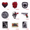 A collection of embroidered patches featuring skulls, roses, and text designs like Punk Rock and Stay Positive.