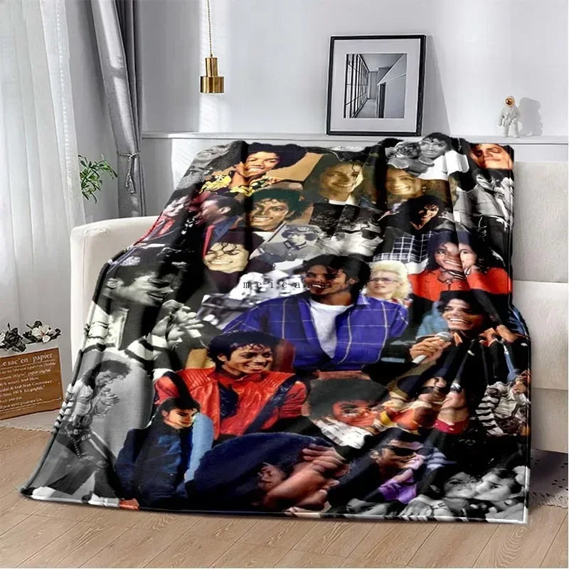 A black and white print of Michael Jackson on a flannel throw blanket.