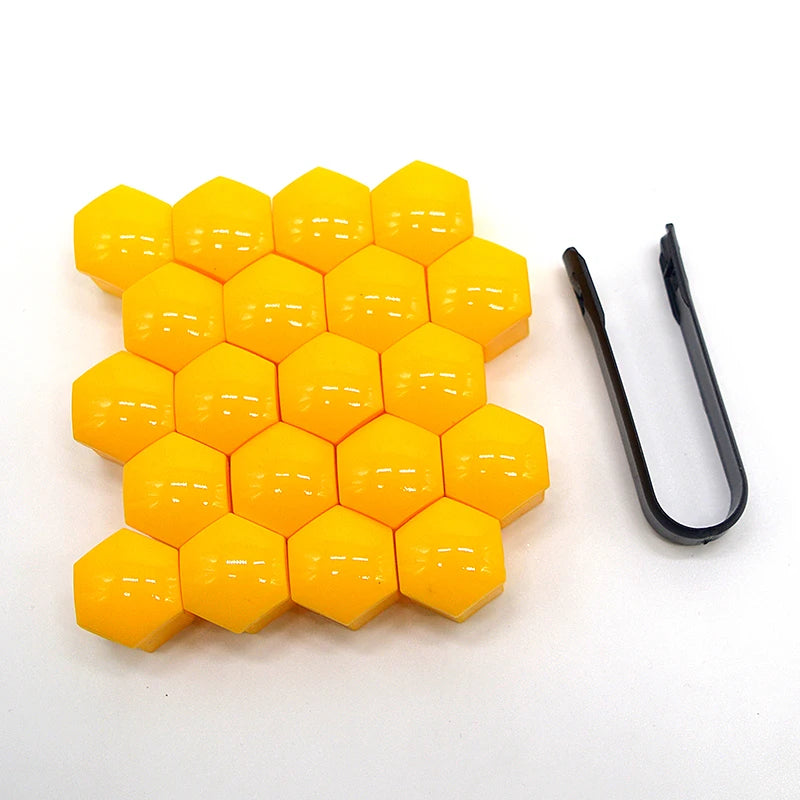 A yellow, honeycomb-shaped set of 20 plastic caps designed to cover car wheel nut bolt holes.