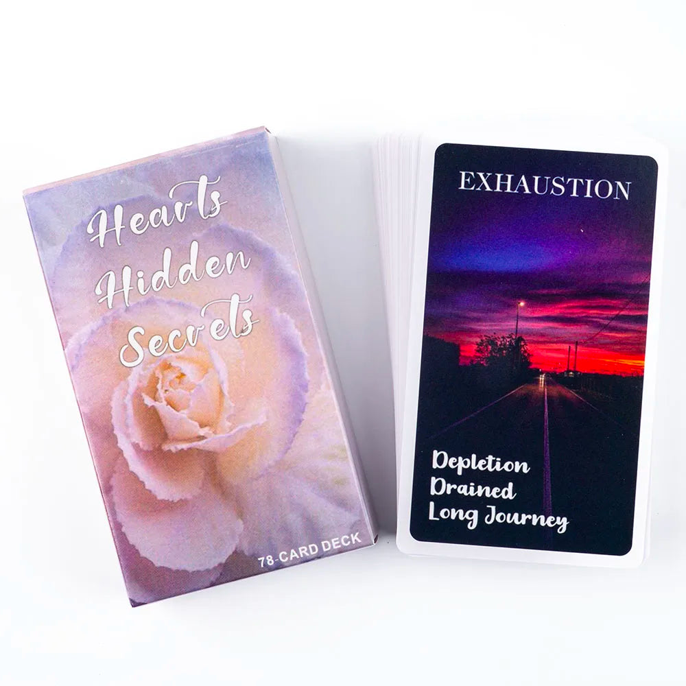 A purple oracle card deck featuring a card titled Exhaustion with a dark, starry background.
