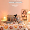 A cozy double-sided velvet warm quilt blanket is displayed on a bed with floral patterns.