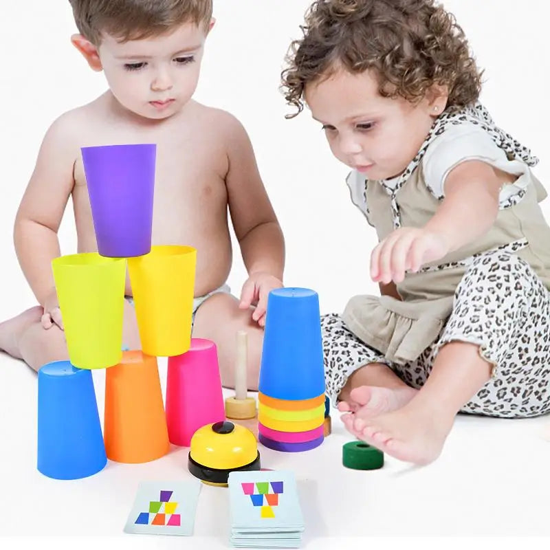 A set of colorful plastic stacking cups and activity cards for toddlers, including purple, yellow, orange, pink, and blue cup