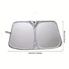 A silver foldable car windshield sunshade with a storage pouch shown flat.