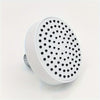 A white shower head with a perforated disk is shown against a white background.