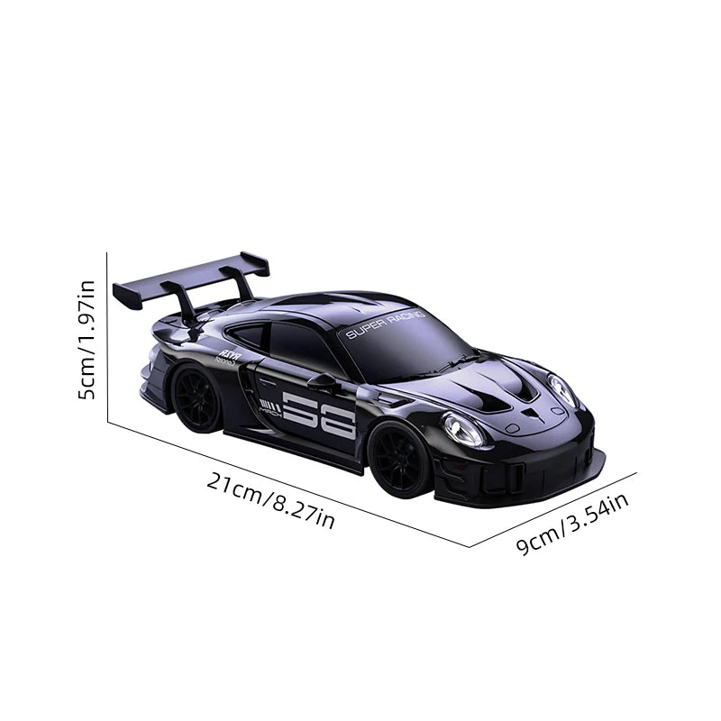Black Super Racing RC drift truck model with a spoiler and wheels