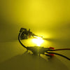 A bright LED headlight bulb with a visible cooling fan is illuminated against a dark background.