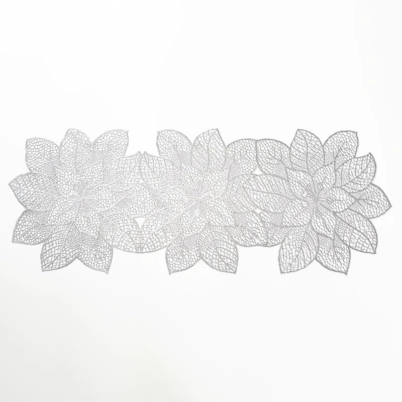 A set of ornate PVC table runners and placemats featuring a detailed floral design.