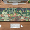 A large extended desk mat featuring a kawaii nature design of various green frogs and potted plants.