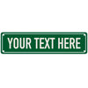 A green rectangular sign with white text that reads YOUR TEXT HERE.