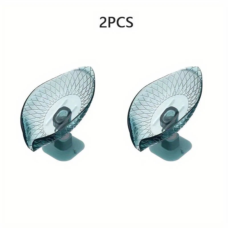 Two clear leaf design self-draining soap dishes with suction cups