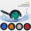 A waterproof LED side marker light assembly with various colored lenses shown being splashed by water.