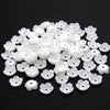 A pile of 100 white acrylic pearl spacer beads for jewelry making