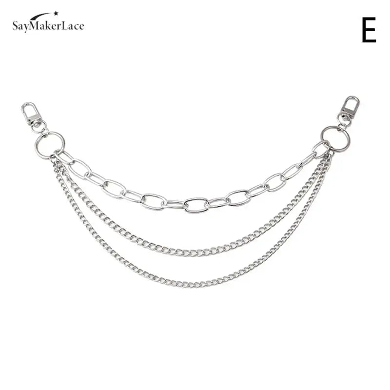 A multi-layer silver chain strap with various pendant charms.