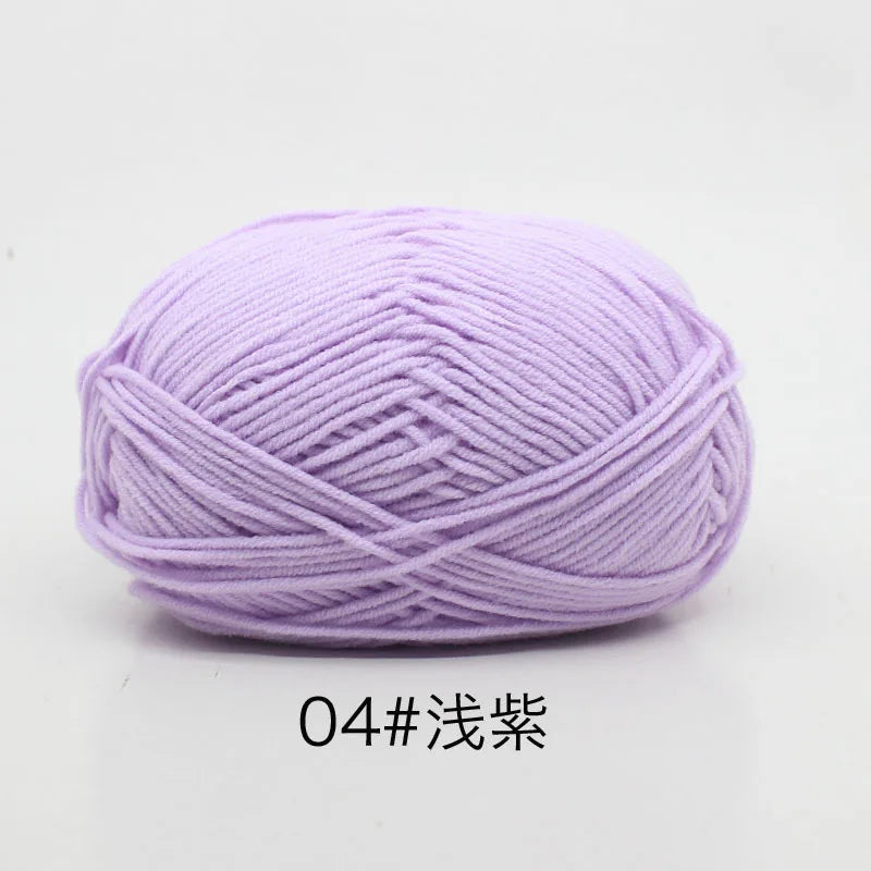 A ball of light purple 4-ply milk cotton yarn for knitting and crochet.